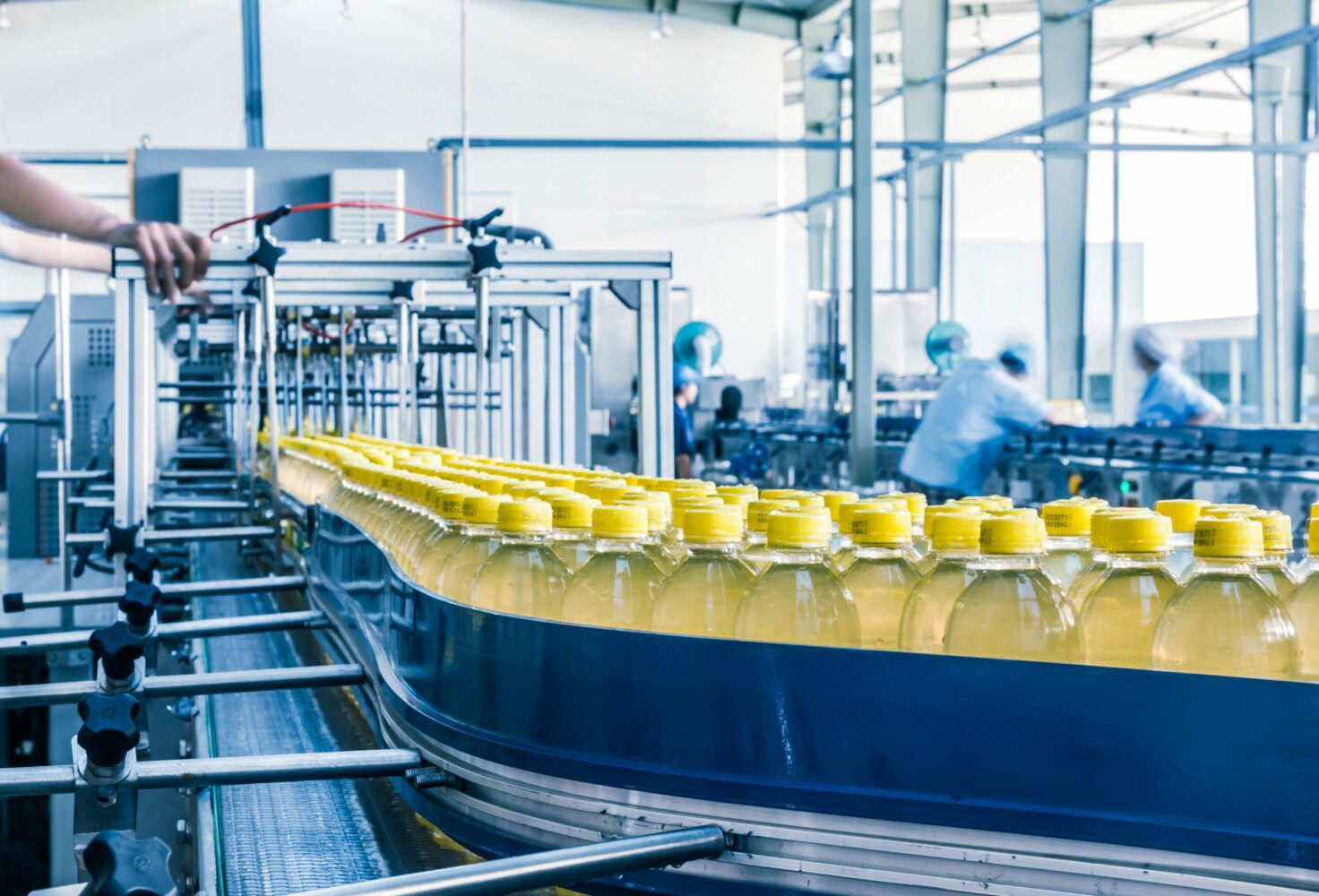 Assembly line of yellow bottles