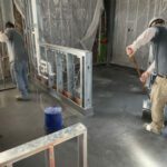 finishing installation of urethane cement in commercial kitchen floor
