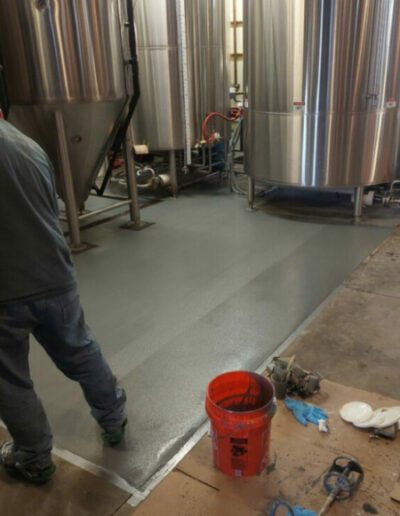 Final coat epoxy cement in brewery in denver