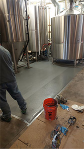 Final coat epoxy cement in brewery in denver