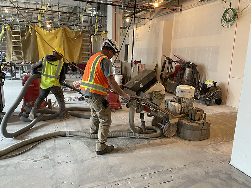 grinding concrete with a huge concrete grinder in Boulder, CO