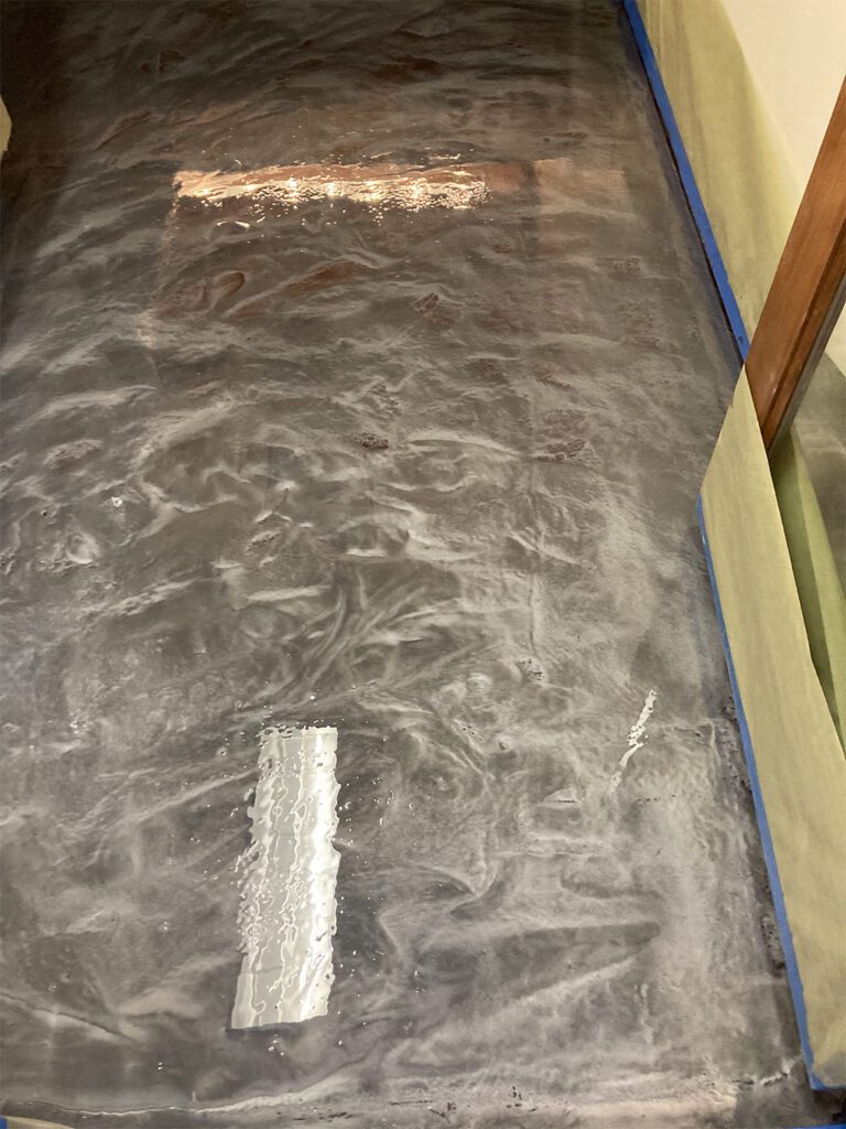gray and black epoxy flooring