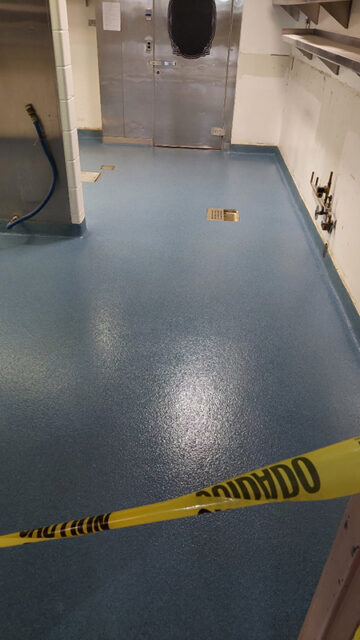 blue quartz epoxy floor in commercial kitchen