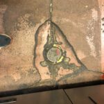 close up of damaged epoxy kitchen floor