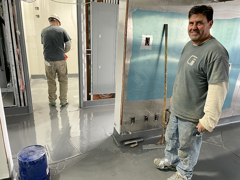 Tim installing urethane cement floor