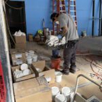 mixing urethane cement in a restaurant
