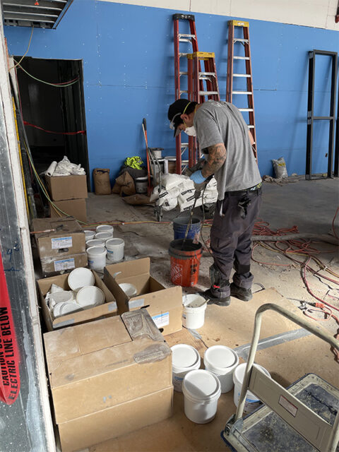 mixing urethane cement in a restaurant