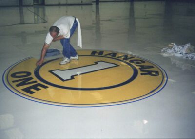 Hangar one logo installed in epoxy floor