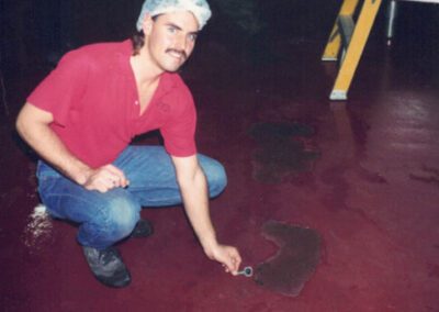 inspecting red epoxy floor